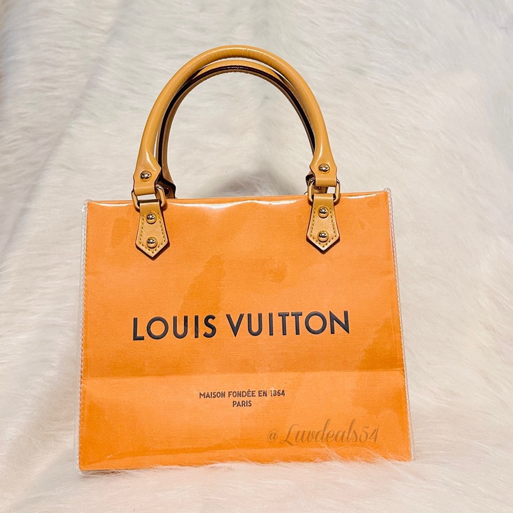 Louis Vuitton Vibrant Orange Tote
Medium Size - Picture 2 of 6